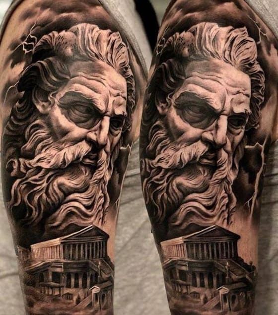 a man's arm with an image of the greek god and his house on it