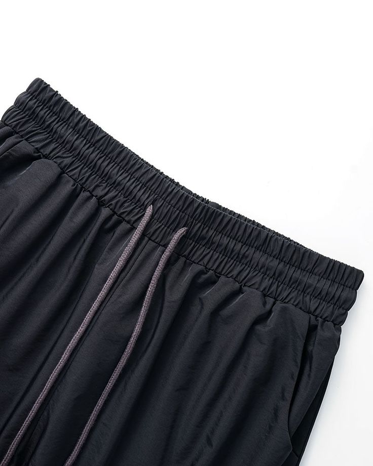 Details: Long parachute pants with stripes designBottom Length: LongMaterials:95% Polyester + 5% Spandex