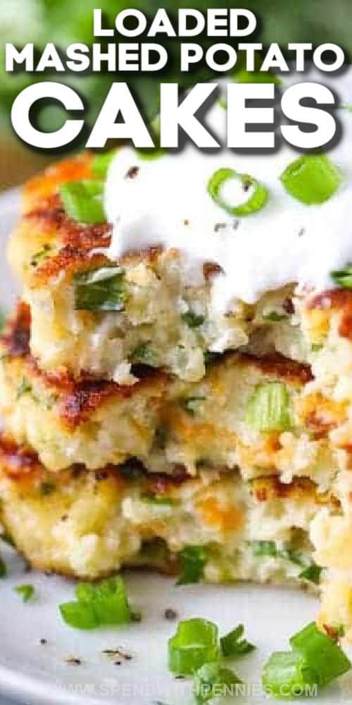 a stack of mashed potato cakes on a white plate with the words loaded mashed potato cakes