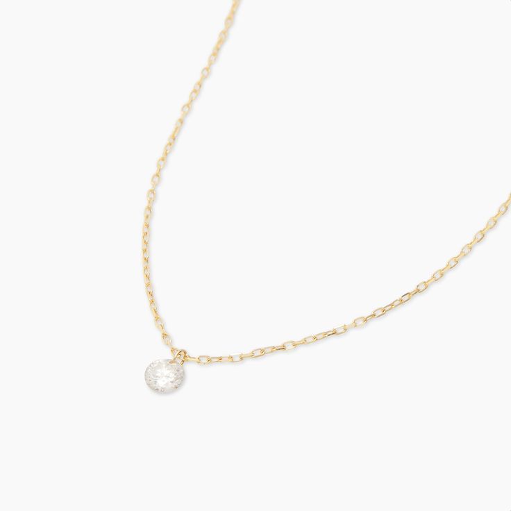 Enjoy our take on the floating diamond necklace. Crafted of 18k gold and completed with a single laser-cut diamond, this necklace is the piece your jewelry box has been waiting for. Product Details 0.07 total carat weight 2.7mm JK SI3 white diamond 18k gold 14 7/8" chain + 1" extender. Adjustable in 1 inch increment 14 7/8" - 15/7/8" Spring ring closure | Floating Diamond Necklace in Gold, Women's in 18k gold by Fine Formal Solitaire Necklace With Delicate Chain And Round Pendant, Classic Solitaire Necklace With Delicate Chain For Anniversary, Elegant Round Pendant Diamond Necklace For Everyday, Elegant Yellow Gold Solitaire Necklace Gift, Classic Necklace With Delicate Chain And Cubic Zirconia, Delicate Diamond Necklace With Delicate Chain For Formal Occasions, Delicate Diamond Necklace With Delicate Chain For Formal Events, Elegant Cubic Zirconia Diamond Necklace With Delicate Chain, Classic Solitaire Necklace With Delicate Chain