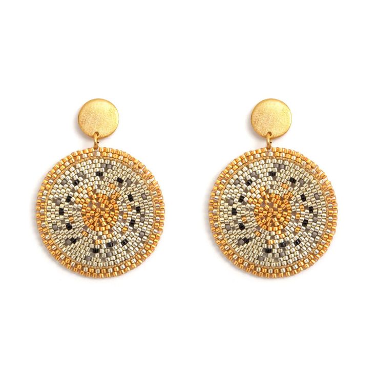 Handcrafted with colorful miyuki beads that are woven together to create a lively mandala pattern. Product details: Miyuki beads 100% authentic Handcrafted in our studio in NYC 24k gold plated bronze and hypoallergenic posts. Dimensions: 1.58 in - 40 mm Weight: 0.02 oz Handmade Gold Beaded Round Earrings, Traditional Gold Beaded Earrings With Tiny Beads, Traditional Gold Earrings With Tiny Beads, Traditional Handwoven Gold Beaded Earrings, Traditional Gold Beaded Earrings With Colorful Beads, Artisan Gold Beaded Earrings, Traditional Gold Handwoven Beaded Earrings, Bohemian Gold Beaded Circle Earrings, Gold Beaded Earrings Gift