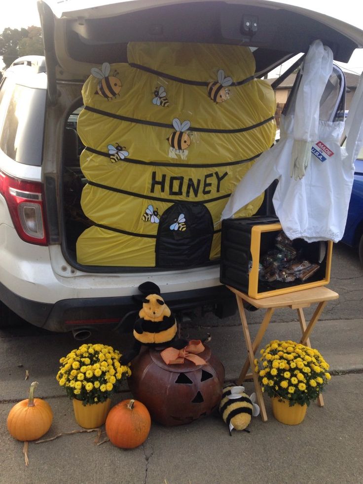 the back of a van with honey decorations