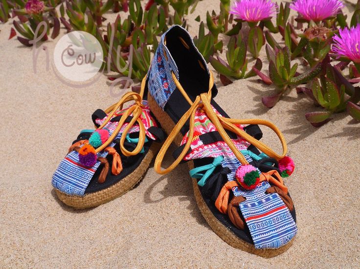 Unleash your bohemian soul with these totally unique handmade vegan cotton tribal shoes. These sandals are made from beautiful upcycled vintage Hmong tribal woven textiles. The Hmong tribe are an ethnic hill tribe group which lived near me in the mountains in the north of Thailand. They have a rope trimmed heel and a rubber sole. They are totally unique and will bring out the tribal women in you. Please note you will may not receive the exact same sandals as shown in the photos. All my sandals a Summer Huarache Sandals With Woven Sole For Beach, Bohemian Summer Huarache Sandals With Woven Sole, Summer Bohemian Huarache Sandals With Woven Sole, Bohemian Woven Sandals For Beach Season, Fair Trade Huarache Sandals For Summer Vacation, Bohemian Huarache Sandals With Woven Sole For Vacation, Summer Beach Huarache Sandals Fair Trade, Bohemian Woven Sandals For Spring, Casual Woven Sandals For Festival