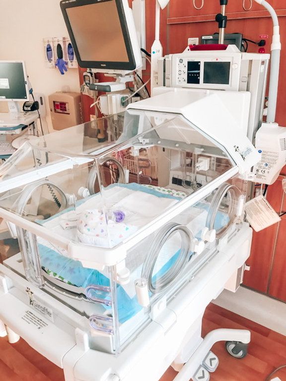 a hospital room with medical equipment in it