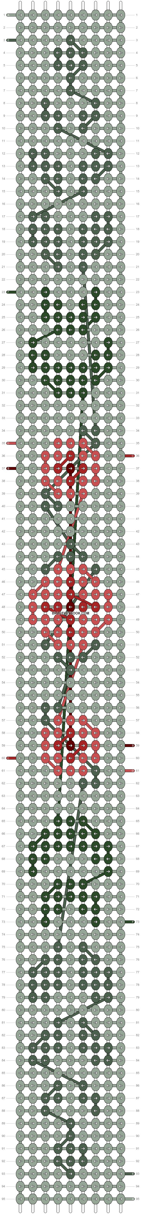 a cross stitch pattern with red and green lines