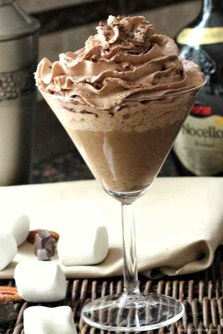 chocolate mousse in a martini glass with marshmallows