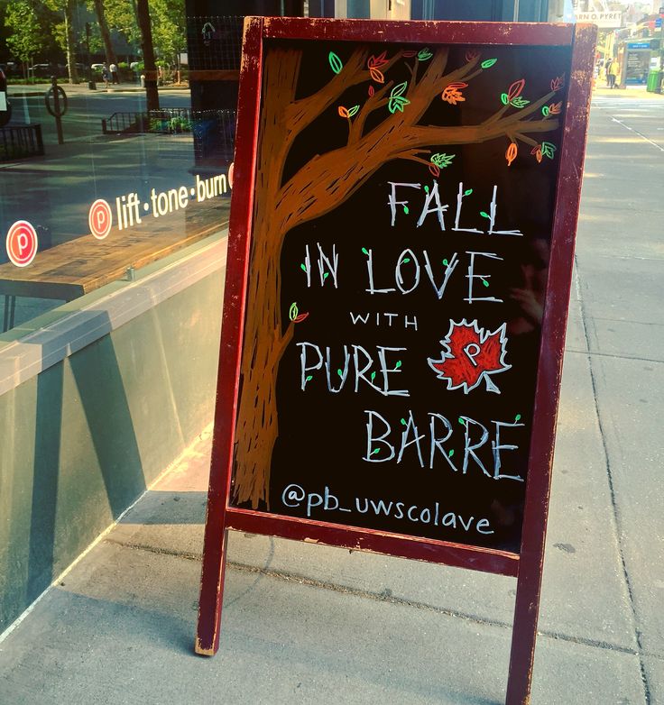 a sign on the sidewalk that says fall in love with pure barbeque