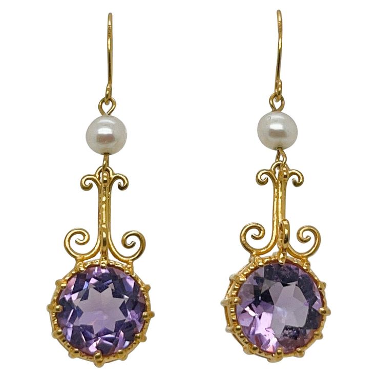 A very fine pair of earrings from the Metropolitan Museum of Art. In satin finished 14k yellow gold . Each earring prong set with a round faceted amethyst gemstone suspened below around white pearl and ear hook. The gold has a satin finish beautifully highlights the purple in the amethyst. Simply a wonderful Etruscan Revival style pair of earrings! Date: 20th Century Overall Condition: It is in overall good, as-pictured, used estate condition with some fine & light surface scratches and other si Cabin Door, Princess Jewelry, Jewelry Illustration, Royal Dresses, Ocean Jewelry, Dream Girl, Amethyst Jewelry, Jewel Box, Amethyst Earrings