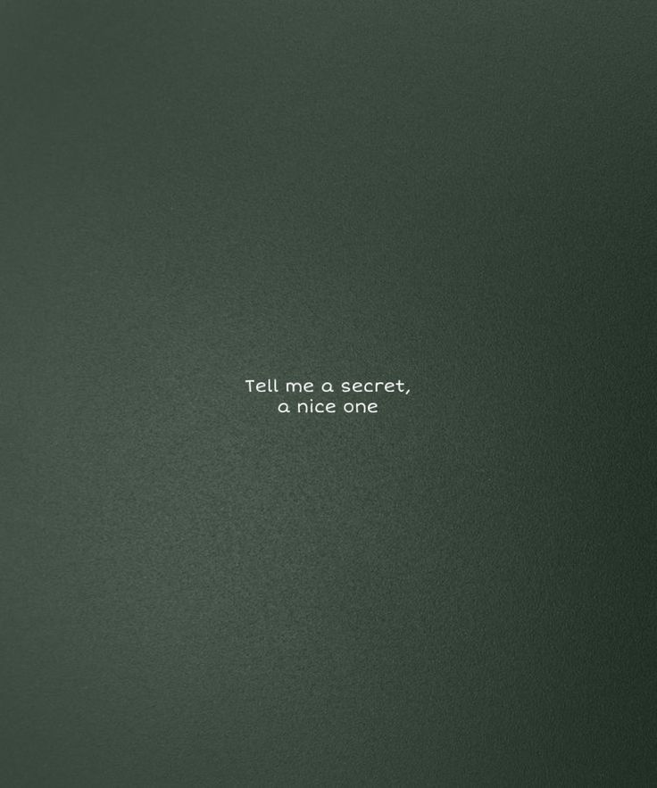 the words tell me a secret, a nice one written in white on a dark green background