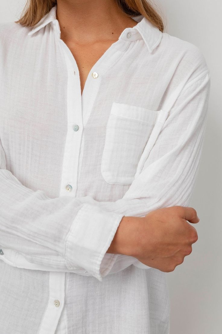 This lightweight button down creates a classic-timeless look when paired with jeans! Relaxed Button-up Shirt With Rolled Sleeves, Relaxed Fit Top With Button Cuffs, Timeless Relaxed Fit Tops With Button Cuffs, Timeless Relaxed Fit Top With Button Cuffs, Timeless Shirt With Button Cuffs And Relaxed Fit, Relaxed Button-up Shirt For Casual Gatherings, Classic Tops With Rolled Sleeves For Casual Gatherings, Timeless Relaxed Fit Button-up Shirt, Timeless Relaxed Fit Tops With Button Closure