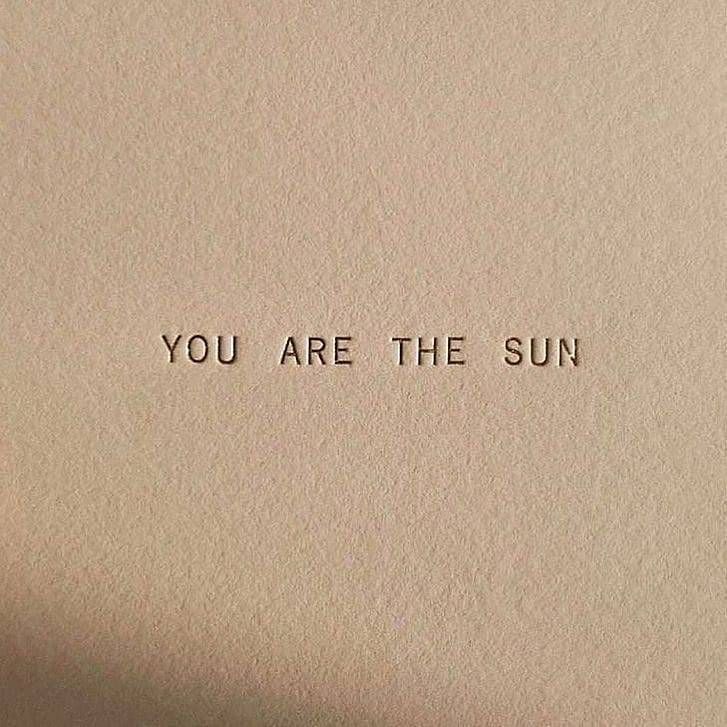 an old typewriter with the words you are the sun printed on it's paper