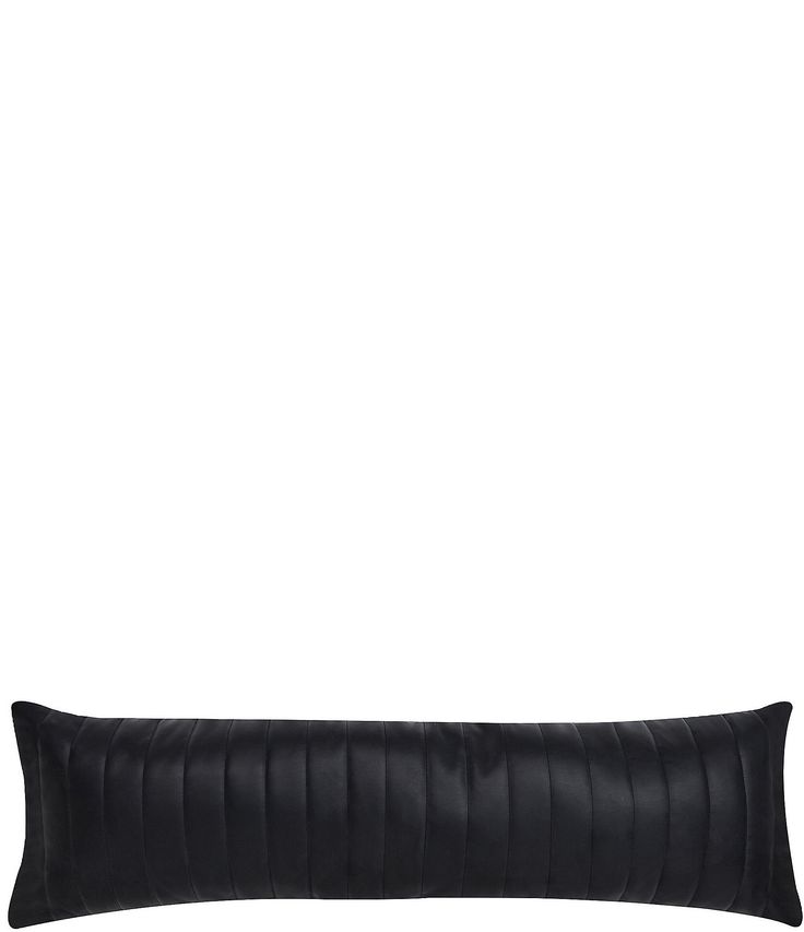 a black leather pillow on a white background