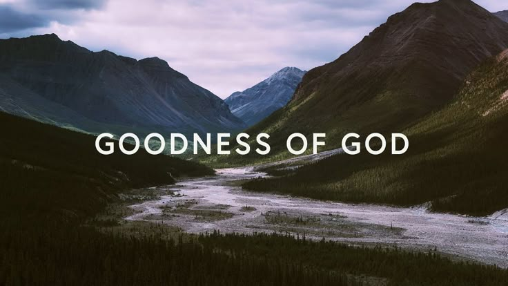 mountains with the words goodness of god in front of them and an image of a river running through it