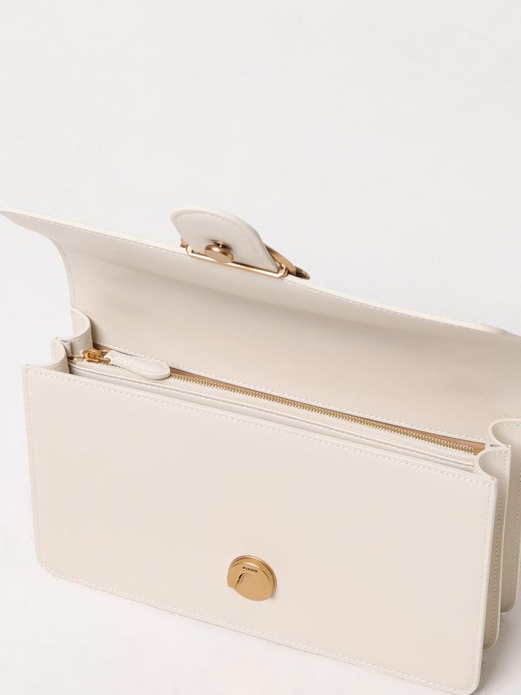 Find PINKO Shoulder Bag on Editorialist. This Pinko shoulder bag features a gold tone turn lock closure, a chain strap and the Pinko logo on the front. It can be worn on the shoulder or crossbody. Timeless Gold Rectangular Flap Bag, Timeless Gold Flap Bag With Gold-tone Hardware, Timeless White Bag With Turn-lock Closure, Everyday Luxury Crossbody Shoulder Bag With Turn-lock Closure, Luxury White Shoulder Bag With Turn-lock Closure, Timeless Gold Luxury Shoulder Bag, Luxury Flap Bag With Metal Hardware For Everyday, Timeless Rectangular Flap Bag With Chain Strap, Timeless Gold Flap Bag For Formal Occasions