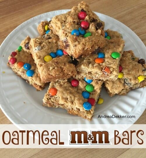 oatmeal m & m bars on a plate with the title above it