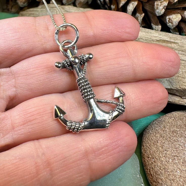 Solid Sterling Silver Anchor Pendant on an 18" chain A beautifully detailed, heavy sterling silver anchor is perfect for any lover of the ocean and all things nautical! This 1" long anchor has amazing detail - you can see every line on the rope that is wrapped around the anchor. This beautiful piece is sure to get some compliments! In sterling silver on an 18" sterling silver chain. Anchors away! Now, one of the hottest new jewelry trends to hit the runways is anchor jewelry. Many of the hottest Sea Anchor, Anchor Jewelry, Anchor Pendant, Anchor Necklace, Nautical Jewelry, The Anchor, Deep Blue Sea, Anchors, Blue Sea