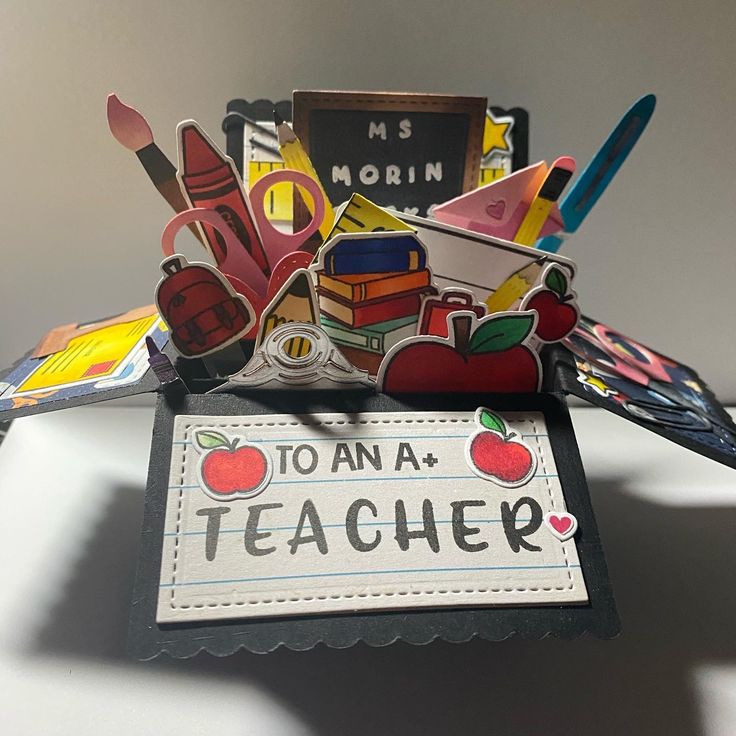 an origami teacher's day card holder