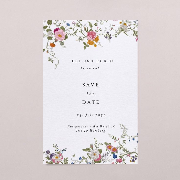 the floral save the date card is shown