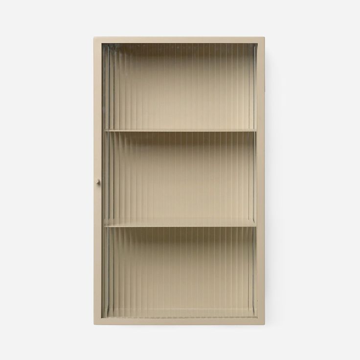 an empty shelf with three shelves on the bottom and one section open to show it's contents