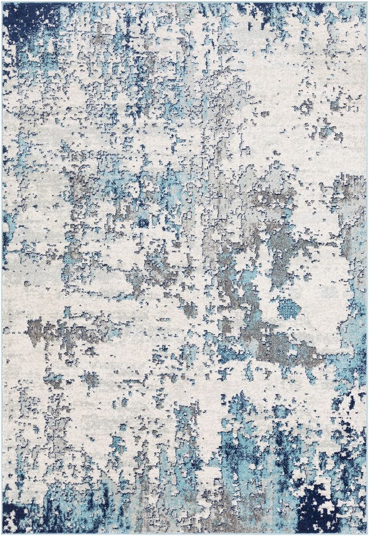 an abstract rug with blue and white colors