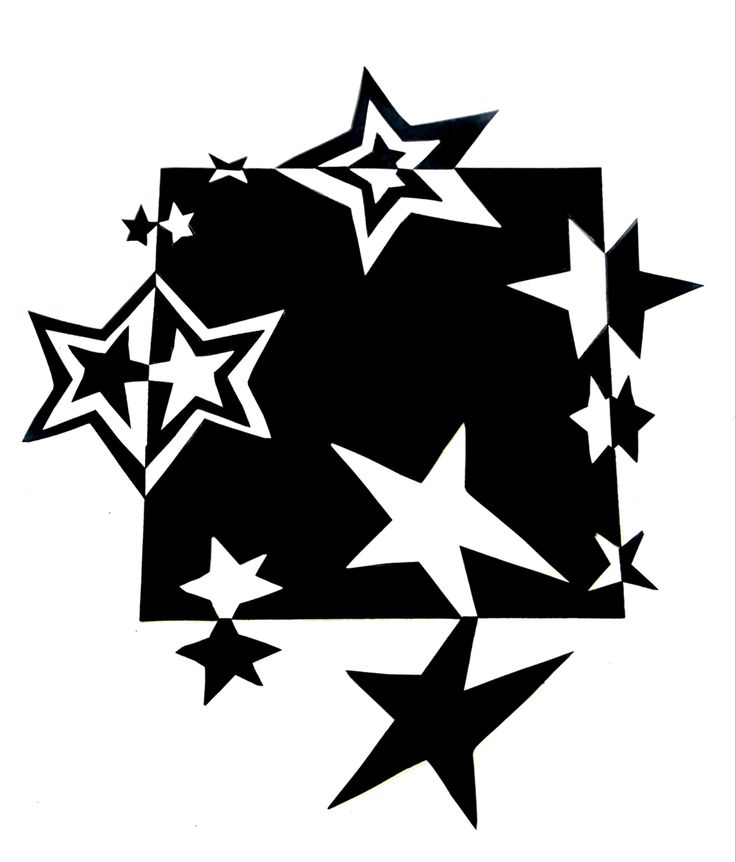 black and white stars are flying in the air