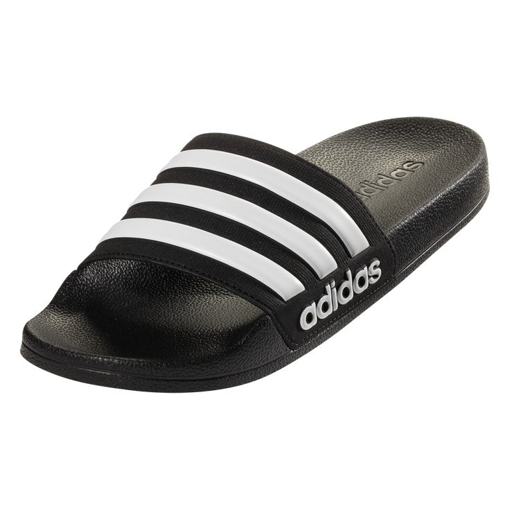 adidas adilette Cloudfoam Slides Junior. Slip into soft comfort with these slides. They're made with a cloudfoam footbed so your feet feel energized after work-outs. < BR>Single-bandage molded EVA upperContoured footbedcloudfoam plus footbed helps recharge your energy with pillow-soft cush ioningInjected EVA outsole for lightweight comfort Comfortable Adidas Slip-on Slides, Adidas Synthetic Slip-on Slides, Adidas Slip-resistant Slip-on Slides, Adidas Sporty Slides For Training, Adidas Sporty Synthetic Slides, Comfortable Adidas Slides With Synthetic Material, Adidas Cushioned Slides For Sports, Adidas Sporty Slip-resistant Slides, Adidas Slides With Cushioned Footbed For Sports