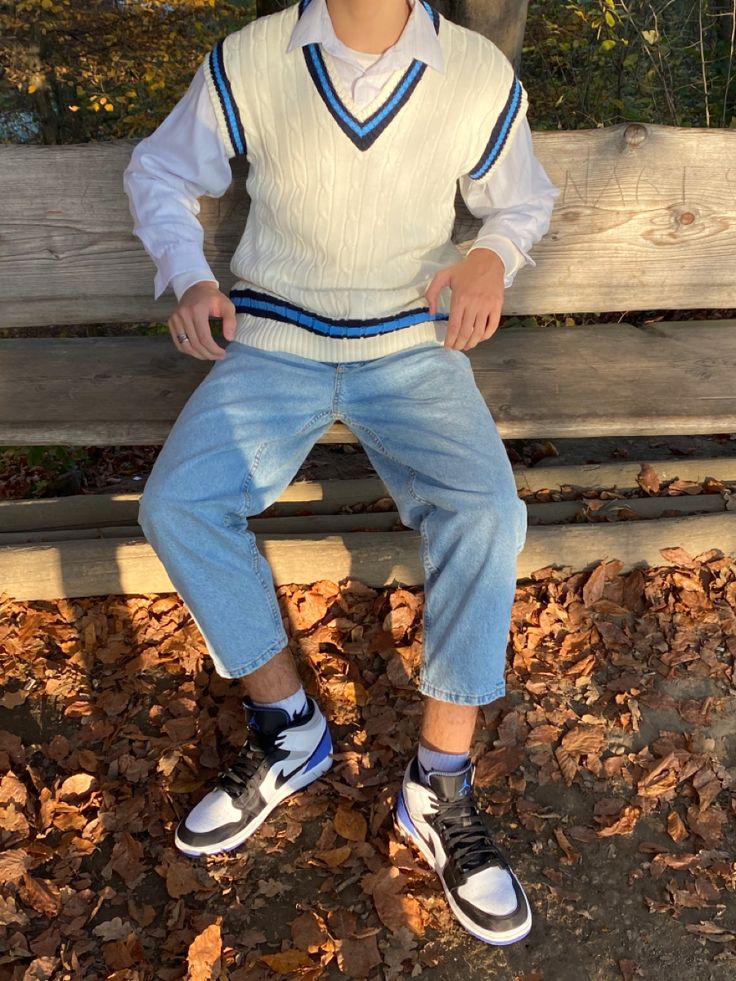 indie boy wearing jordans with a sweater vest for fall Outfits With Sweater Vest Men, How To Style Vests Outfits Men, Vest Ideas Men, Streetwear Sweater Vest, Man Sweater Vest Outfit, Men In Sweater Vests, Sweater Vest Fits Men, Mens Sweater Vest Fashion, Styling Sweater Vest Men