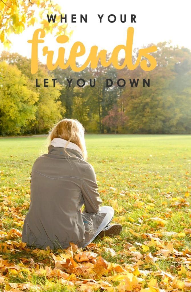 a woman sitting in the grass with her back to the camera and text overlay reads, when your friends let you down