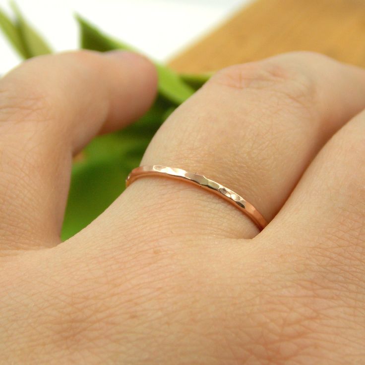 This simple, dainty gold ring has been given a hammered texture and then polished to a shine. It is small which makes it a great ring to stack with other rings. Stack as many as you want in any color you want!! Choose your favorite from Yellow, Rose, or White gold. Each ring is handcrafted just for you in any size you need. This ring makes for a nice simple wedding band or promise ring. Just over 1mm thick Listing for ONE ring 14K Solid Gold, choose from white, yellow, or rose gold. Find a set o Simple Hammered 14k Gold Rings, Dainty 14k Gold Hammered Rings, Dainty Hammered 14k Gold Rings, Dainty Hammered Rose Gold Rings, Dainty Hammered Midi Rings For Anniversary, Dainty Hammered Stackable Wedding Rings, Simple Hammered Rings For Anniversary, Rings Stack, Simple Wedding Band