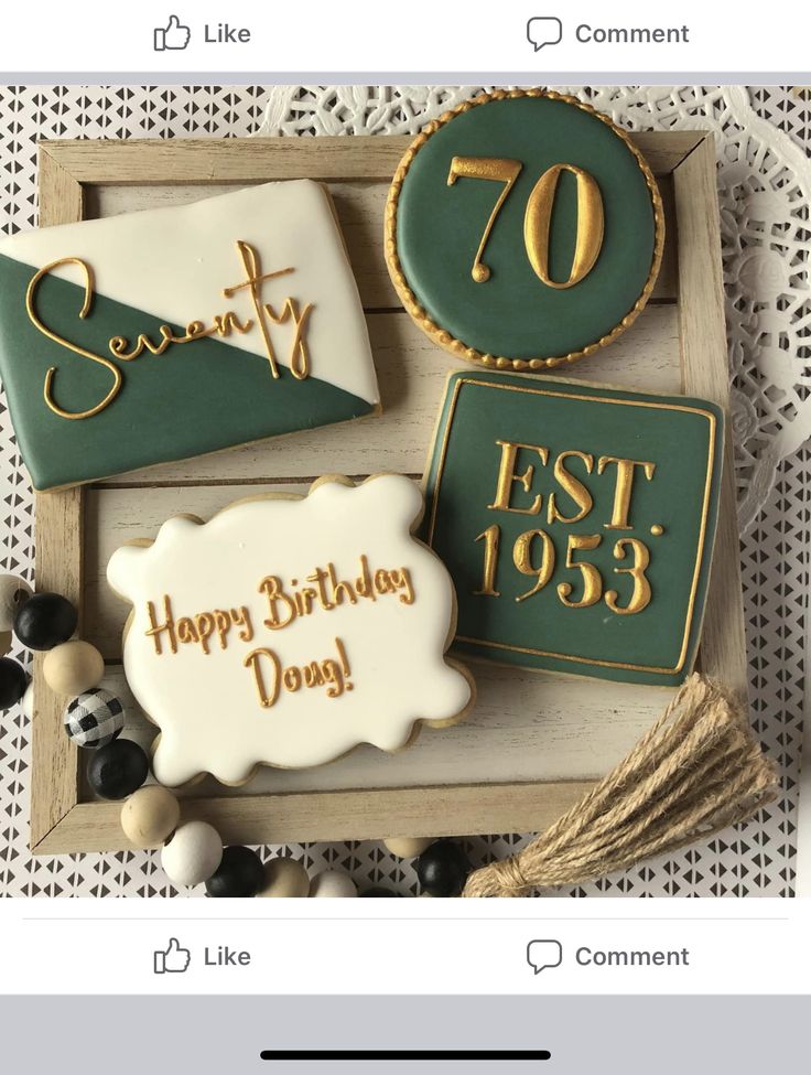 some cookies that are on top of a wooden tray with the words seventy and happy birthday doris