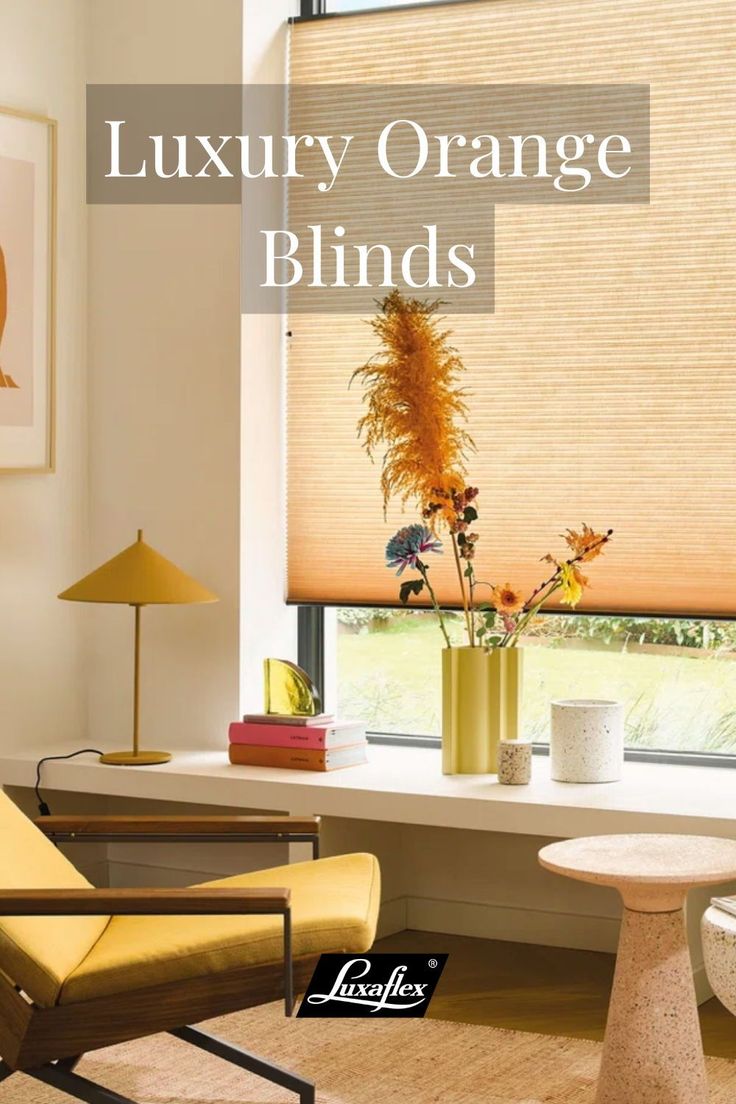 a living room filled with furniture and a large window covered in shades of orange blinds