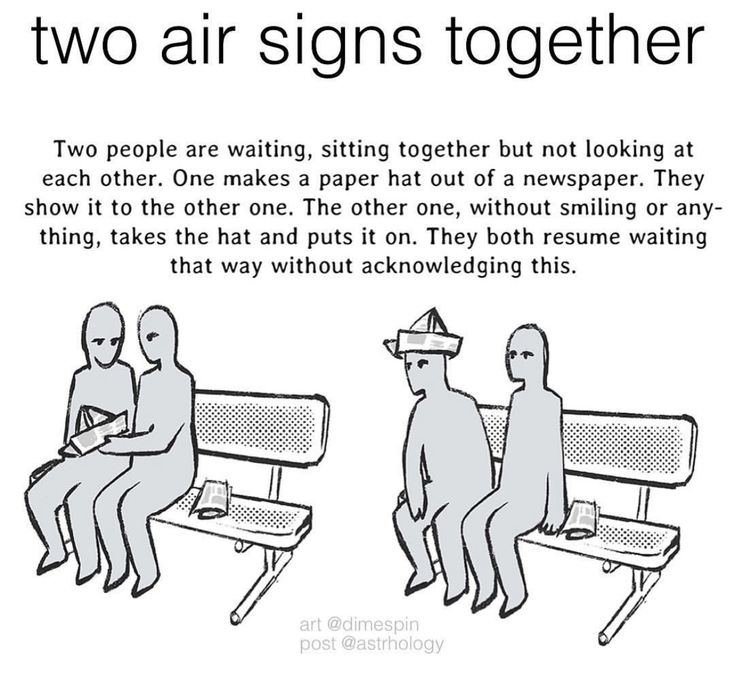 two people are sitting together on a bench