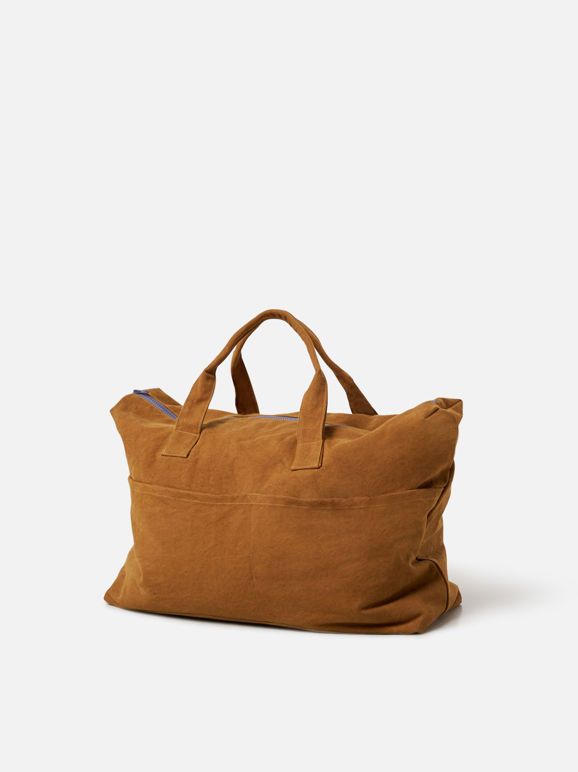 Head out of town with the Marlo overnight bag. The generously sized carryall bag makes a bold colour statement with its warm masala hue contrasting with a soft lupin zip. Weekend Rectangular Shoulder Bag With Zipper Pocket, Weekend Rectangular Bag With Zipper Pocket, Weekend Bags With Leather Double Handles, Rectangular Shoulder Bag With Zipper Pocket For Weekend, Rectangular Bags With Zipper Pocket For Weekend, Overnight Tote Duffle Bag With Zipper Pocket, Tote Duffle Bag With Zipper Pocket For Overnight Trips, Weekend Tote Bag With Zipper Pocket, Weekender Tote Bag With Zipper Pocket For Overnight Trips