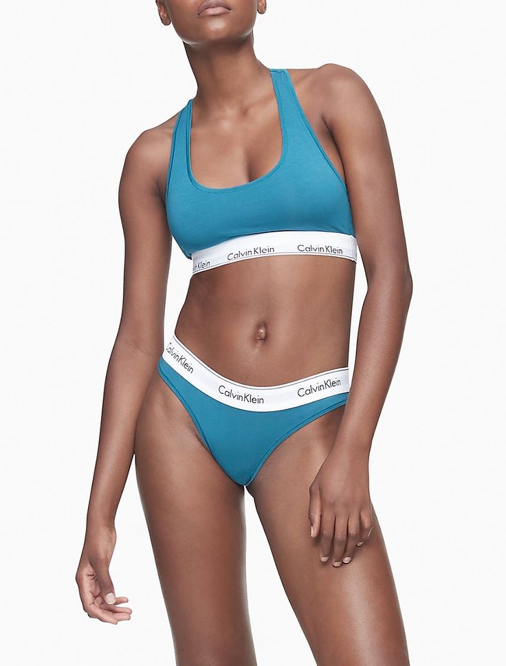 Modern Cotton Unlined Bralette | Calvin Klein Sporty Seamless Cotton Sports Bra, Casual Cotton Bra For Loungewear, Cotton Sports Bra With Light Support For Loungewear, Seamless Cotton Sports Bra For Athleisure, Trendy Cotton Bra For Loungewear, Cotton Medium Support Sports Bra For Loungewear, Cotton Sports Bra With Medium Support For Loungewear, Medium Support Cotton Sports Bra For Loungewear, Sporty Medium Support Bra For Loungewear