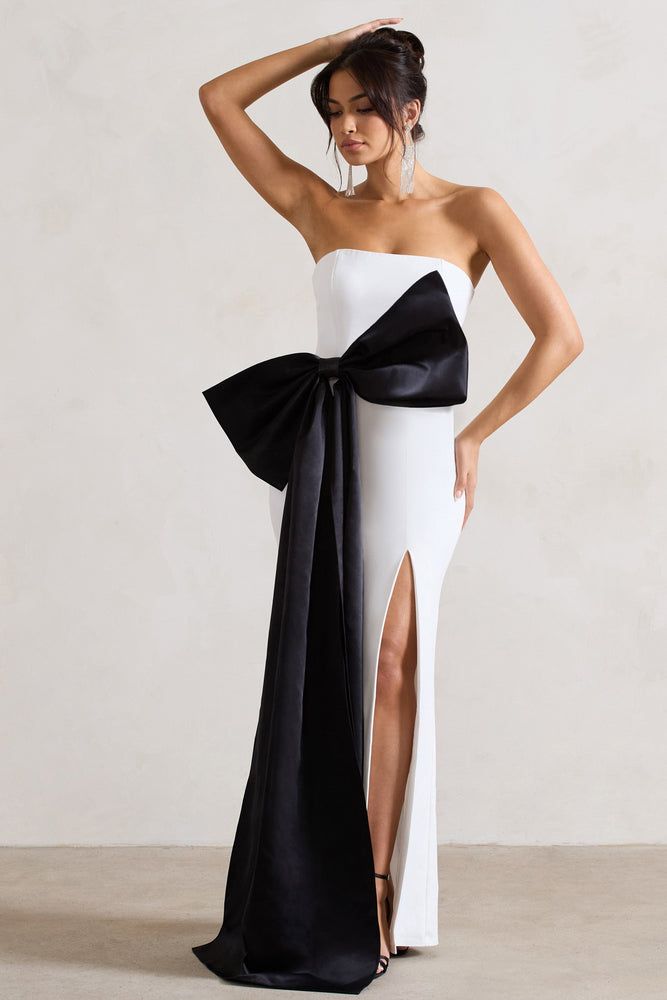 Strapless Dress With Bow For Black-tie Events, Strapless Dress With Fitted Bodice For Black-tie Events, Black Bow Evening Dress For Formal Occasions, Black Formal Evening Dress With Bow, Elegant Fitted Black Wedding Dress, Black Elegant Formal Wedding Dress, Formal Floor-length Black Wedding Dress, Black Floor-length Wedding Dress For Formal Occasion, Black Floor-length Formal Wedding Dress