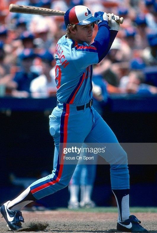 the baseball player is getting ready to hit the ball with his bat during a game