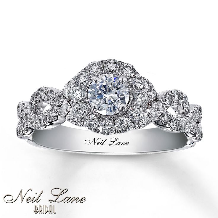 a white gold ring with diamonds on the side and an advertise for neil lane