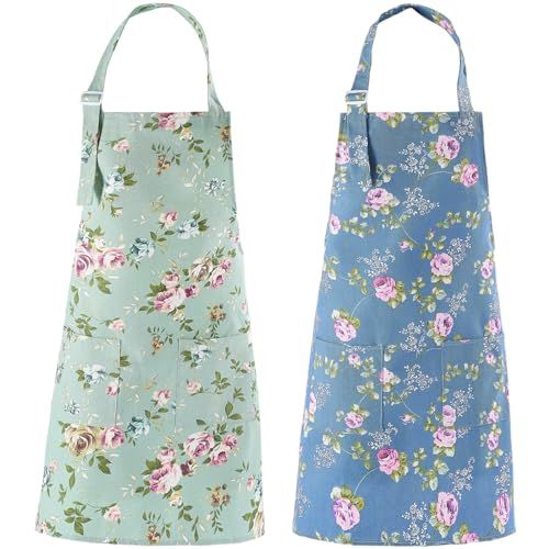 two aprons with flowers on them, one is blue and the other is green