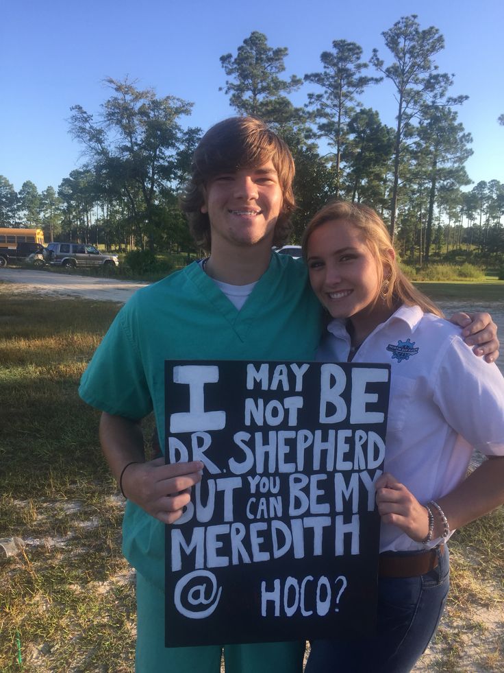 a man and woman standing next to each other holding a sign that says i may be not be shepherd, but you can be my meredith