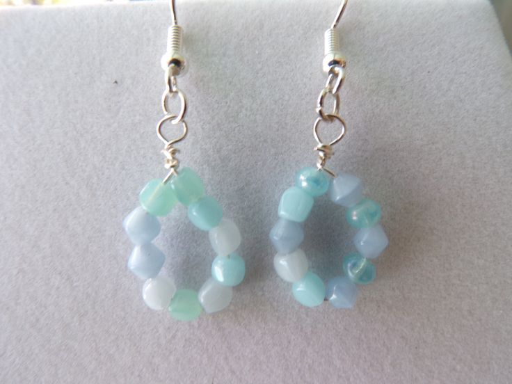 Subtle shades of blue in these fun summer earrings. Summer Light Blue Pierced Earrings, Blue Dangle Hoop Earrings, Hypoallergenic Blue Earrings For Summer, Blue Ear Wire Earrings For The Beach, Trendy Blue Dangle Teardrop Earrings, Blue Dangle Earrings For The Beach, Blue Drop Earrings For Summer, Trendy Light Blue Dangle Earrings, Light Blue Drop Earrings For Summer