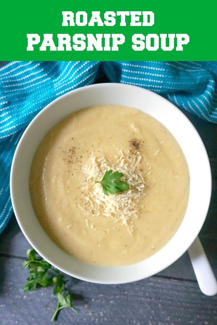 a bowl of roasted parsnip soup with parsley on top and the title overlay reads roasted parsnip soup