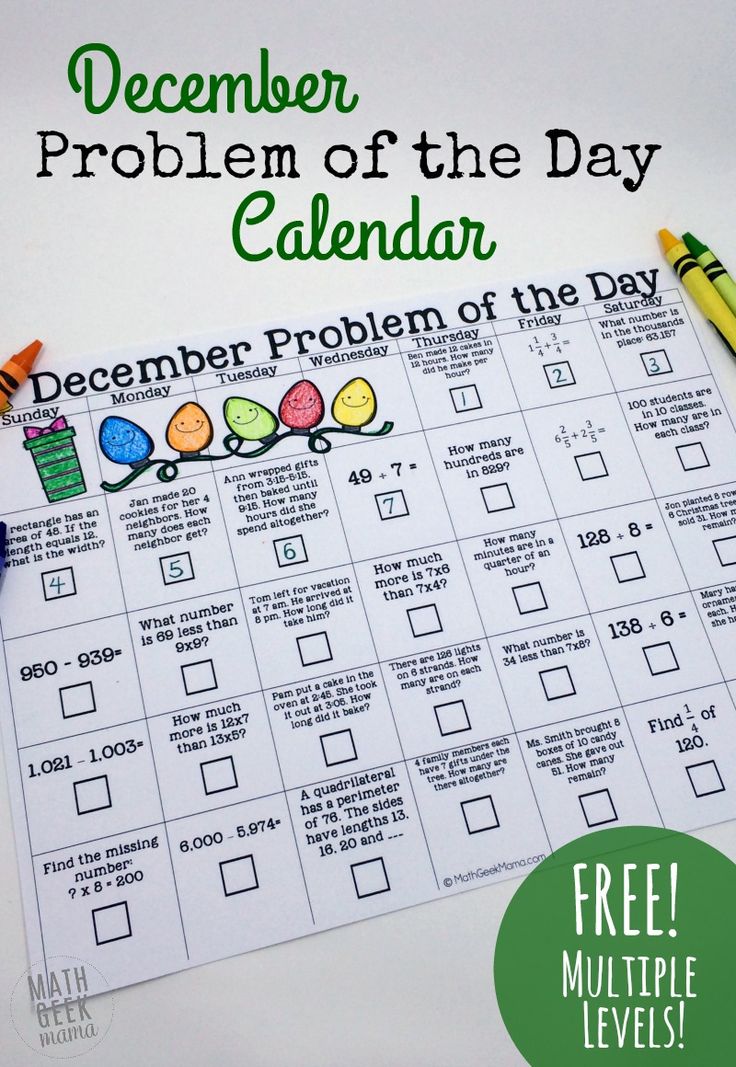 a calendar with crayons and pencils on it, next to a green marker