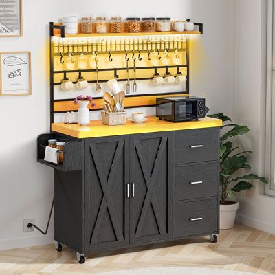 a yellow counter top sitting in front of a wall mounted coffee pot and mug rack