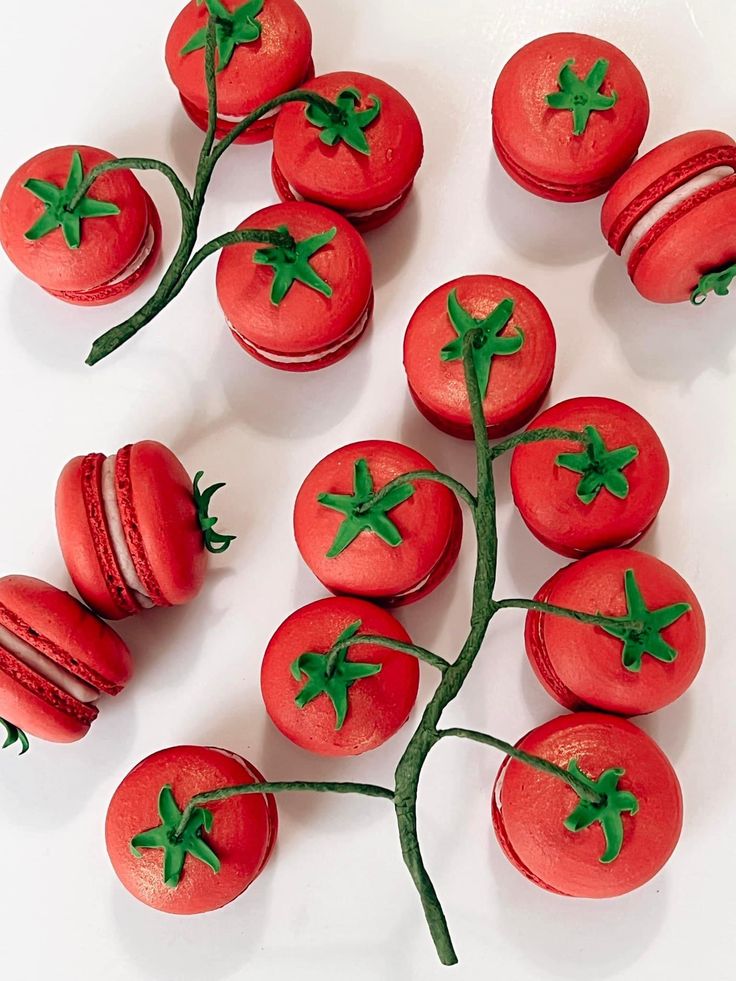 red macaroni and cheese decorated with green leaves on white surface, top view