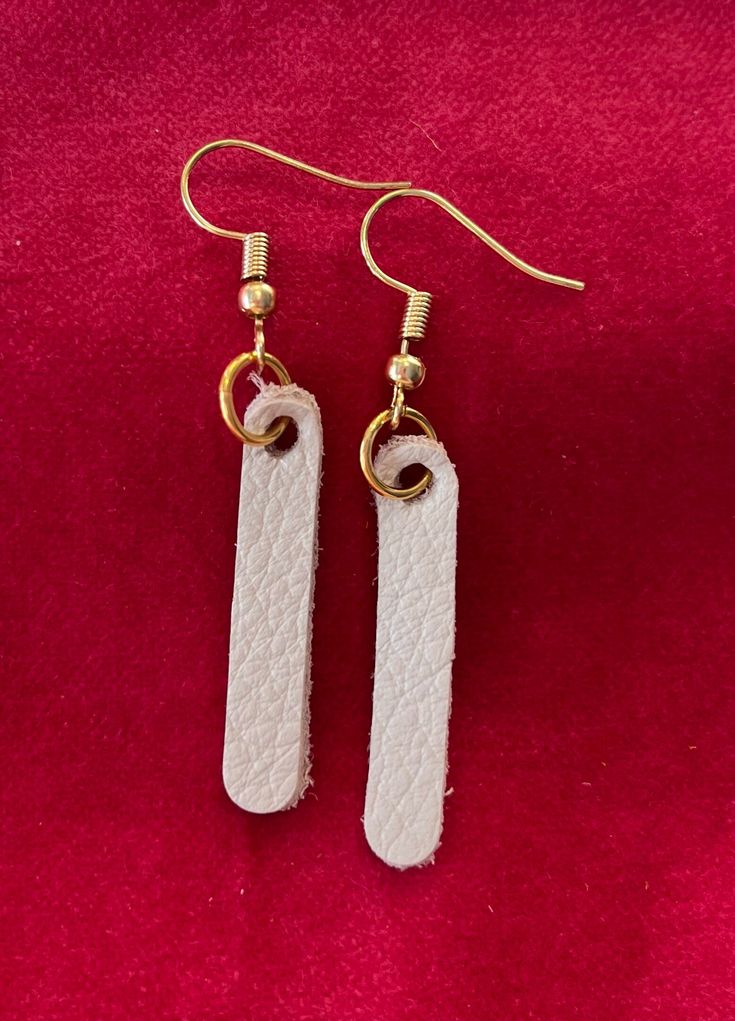 Leather Earrings. Handmade, lightweight earrings in classic bone-colored leather with brass hardware. Handmade White Leather Earrings, White Leather Earrings Gift, White Leather Earrings As A Gift, White Leather Earrings For Gift, Adjustable Beige Earrings For Everyday, Pleasant Grove, Lightweight Earrings, Colored Leather, Light Weight Earrings