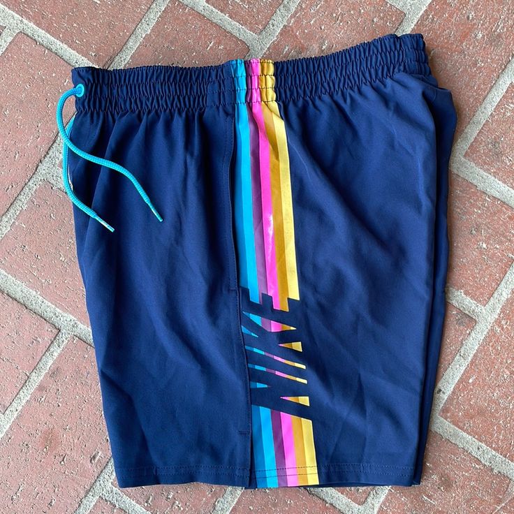 Nike Swim Shorts With Liner Nike Navy Shorts For Summer, Nike Multicolor Sports Bottoms, Nike Multicolor Casual Bottoms, Nike Casual Multicolor Bottoms, Casual Multicolor Nike Bottoms, Nike Blue Bottoms With Elastic Waistband, Casual Royal Blue Bottoms For Spring, Nike Blue Bottoms For Summer, Nike Casual Blue Bottoms