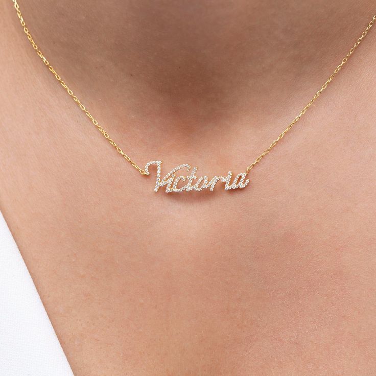 This 14k personalized diamond name necklace is the perfect gift for the bridal party, someone special, or yourself. How to order 1- Pick the fonts you like and send us a message 2- We will send you a picture of your name with the fonts you chose 3- If you like it any of them, place your order. 4- We send a final 3d mock up for approval. 5- Once approved we go ahead and finish your necklace. __________________________________________ M A T E R I A L & L E N G T H Available in 14k Yellow Gold, 14k Classic Nameplate Necklace For Wedding, Elegant Custom Text Name Necklace For Mother's Day, Personalized Nameplate Necklace For Wedding, Elegant Custom Text Nameplate Necklace, Custom Wedding Nameplate Necklace, Classic Wedding Nameplate Necklace, Classic Diamond Name Necklace For Anniversary, Wedding Initial Pendant Name Necklace, Custom Nameplate Necklace With Initials For Anniversary