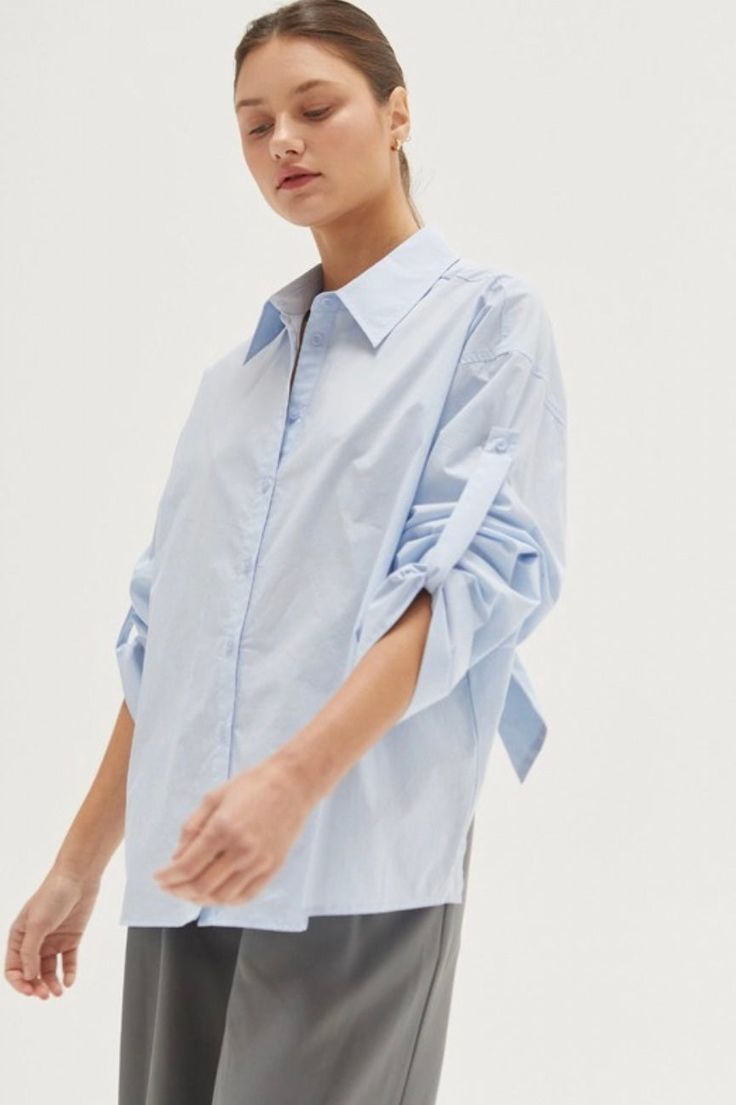 Evie Tie Back Poplin Shirt 100% COTTON -Button front placket -Poplin shirt -Tie back detail -Wide cuffed sleeve hem Model height is 5'9" wearing a small size S Casual Cotton Shirt With Tie Sleeves, Poplin Tops With Button Closure For Daywear, Daywear Tops With Button Closure, Daywear Poplin Tops With Button Closure, Casual Shirt With Tie Sleeves, Spring Cotton Shirt With Tie Sleeves, Casual Work Shirt With Tie Sleeves, Casual Tie Sleeve Tops For Office, Casual Office Tops With Tie Sleeves