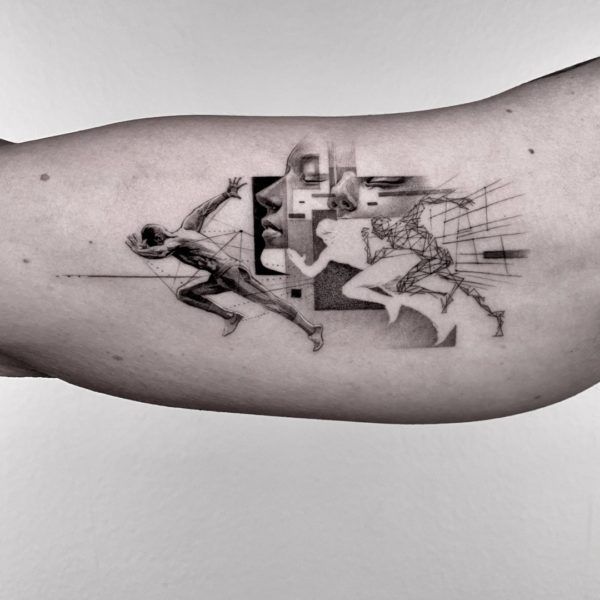 a man's arm with an abstract tattoo on it