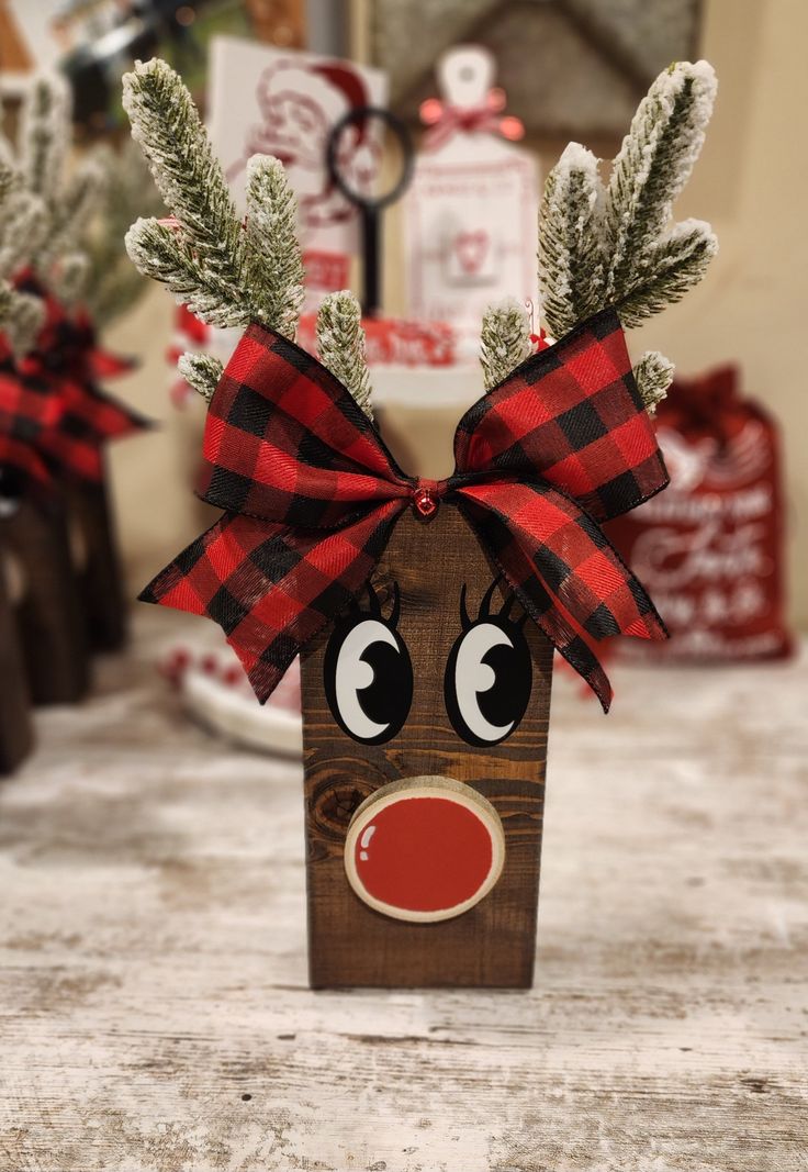 a wooden box with a reindeer head on it